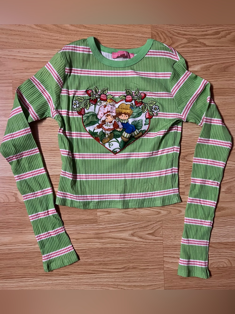 Dolls Kill x Strawberry Shortcake Green Striped Long-Sleeve Heart Patch Tee